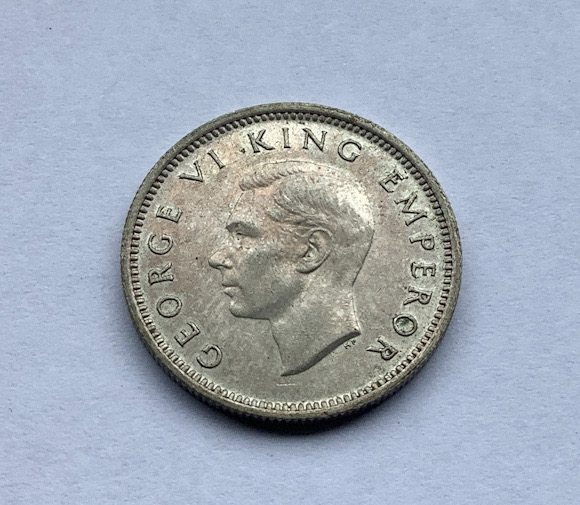 1945 higher grade New Zealand Sixpence coin .500 silver